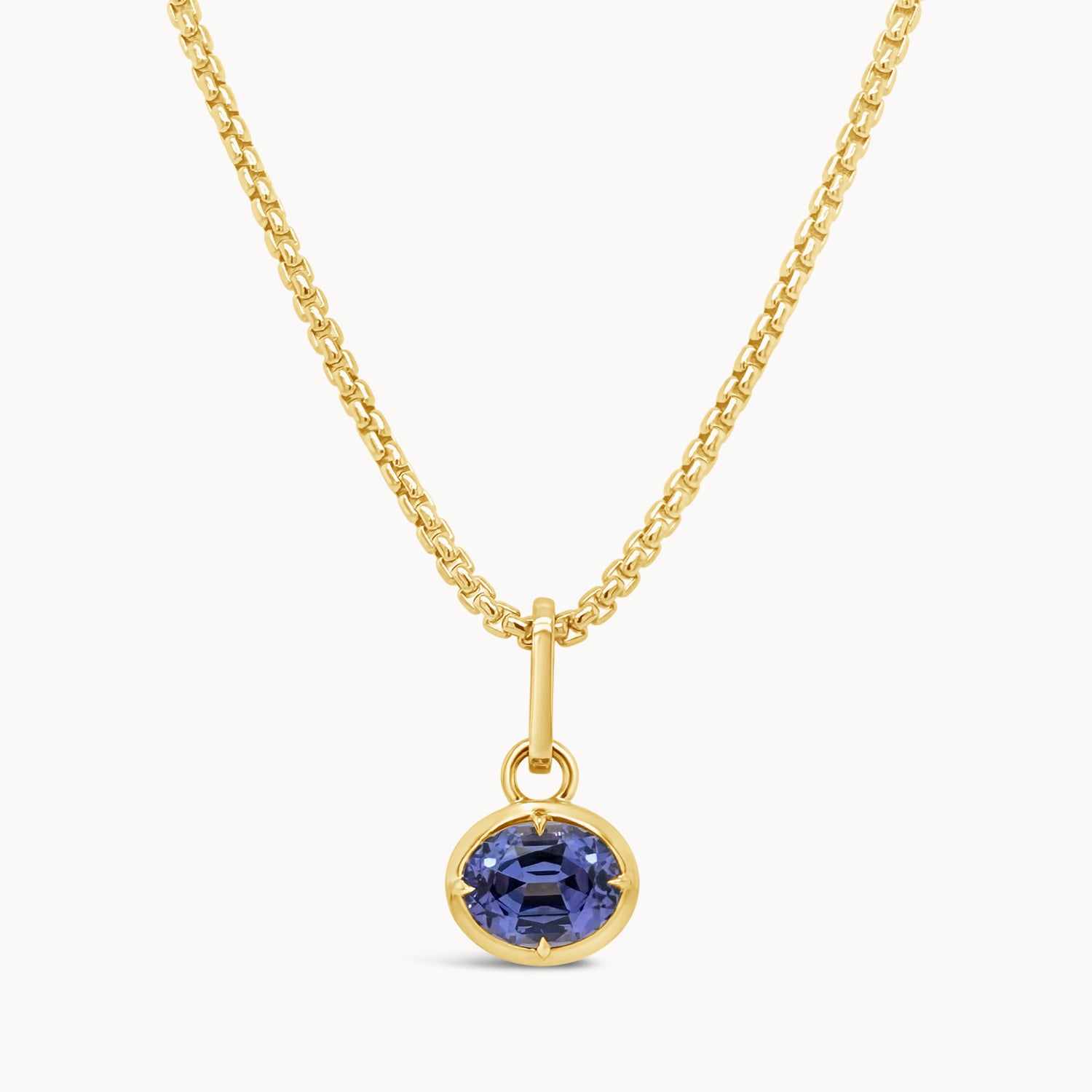 Oval Tanzanite Compass Prong Pendant