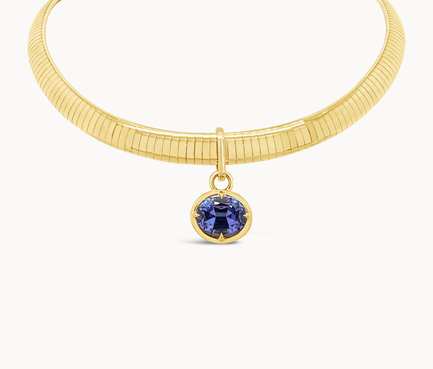 Oval Tanzanite Compass Prong Pendant